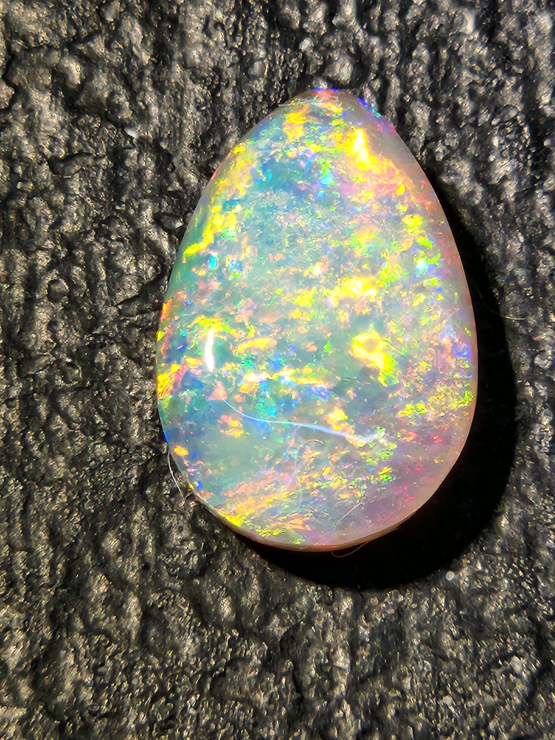 Hand-cut rare Coober Pedy or Lightning Ridge opal by Metrowest Opal.